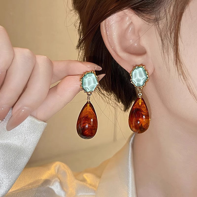 ARETES GOTA ÁMBAR Y PIEDRA AZUL