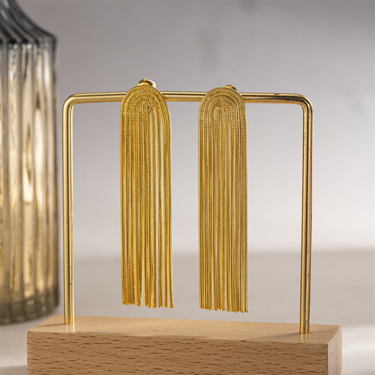 ARETES FLECOS DORADOS