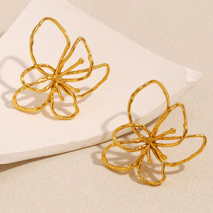 ARETES FLOR DORADA