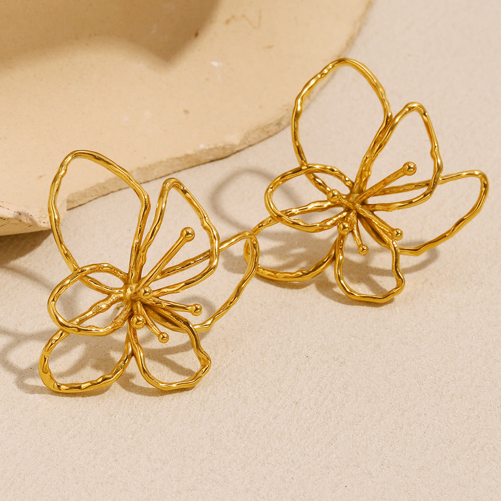 ARETES FLOR DORADA