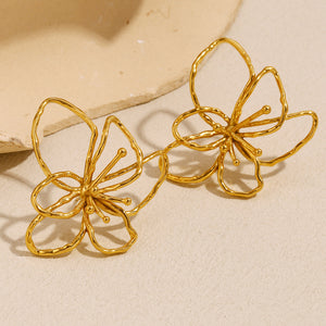 ARETES FLOR DORADA