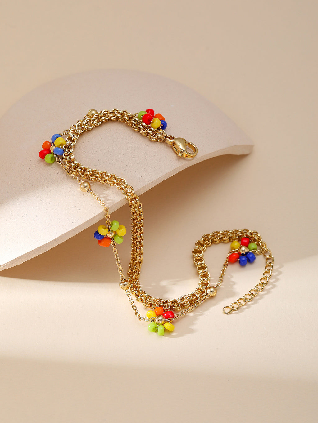 PULSERA FLORES ARCOÍRIS