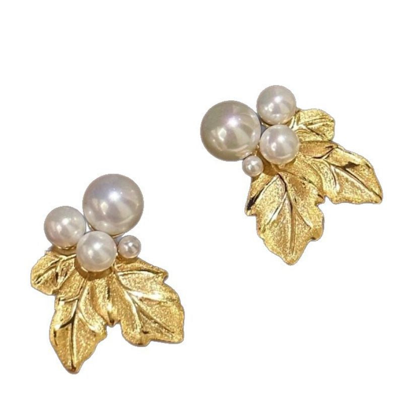 ARETES HOJAS DORADAS