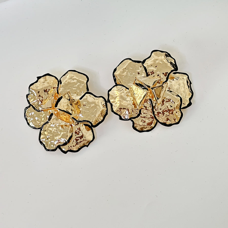 ARETES FLOR DORADA