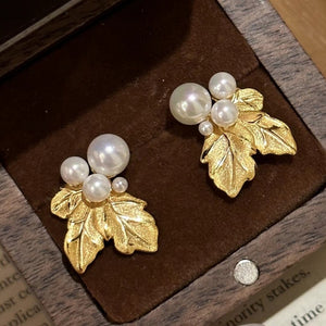 ARETES HOJAS DORADAS