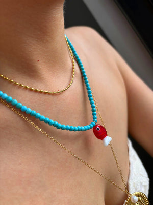 COLLAR TURQUESA CON PEZ ROJO