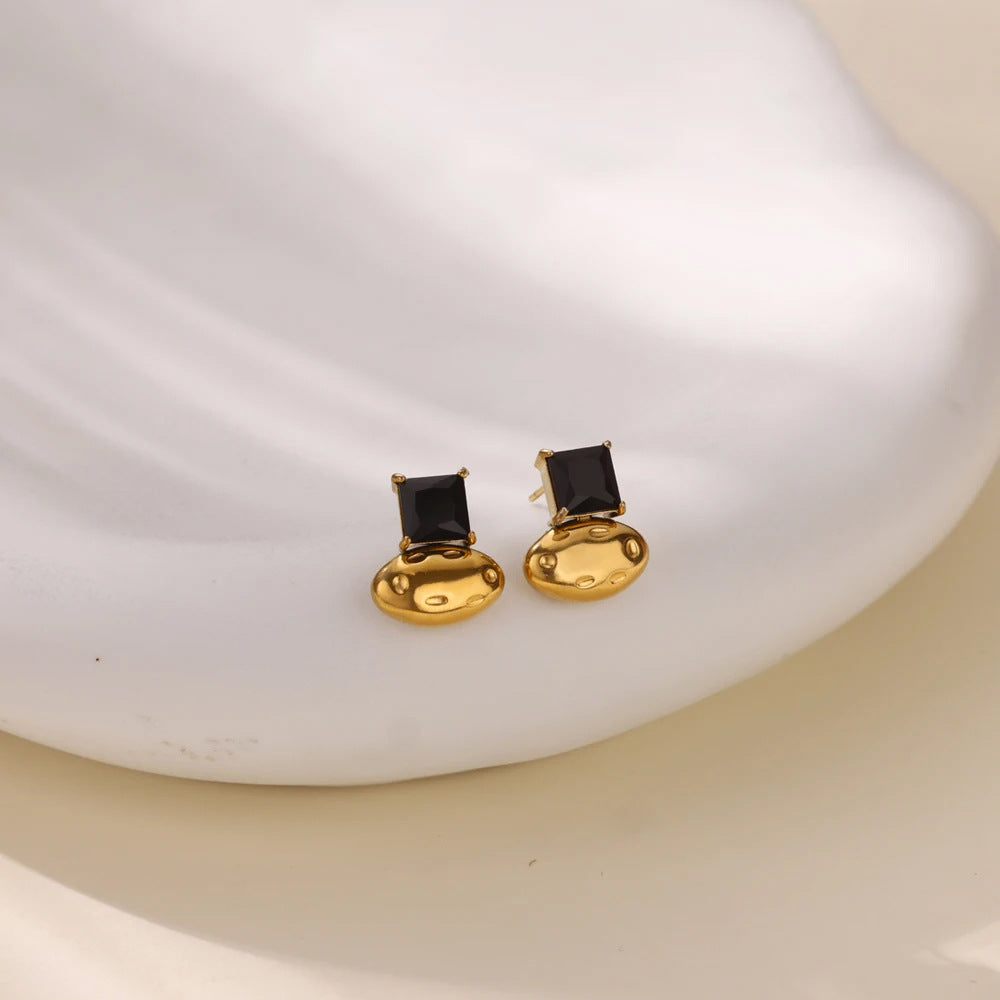 ARETES DETALLES NEGROS