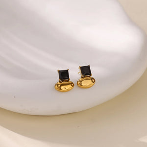 ARETES DETALLES NEGROS
