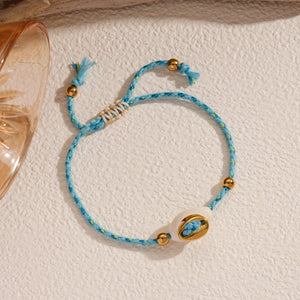 PULSERA AZUL CARACOL