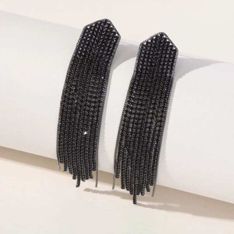 ARETES FLECOS NEGROS