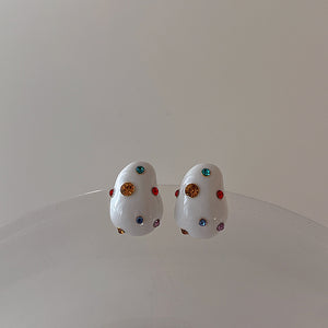 Aretes blancos